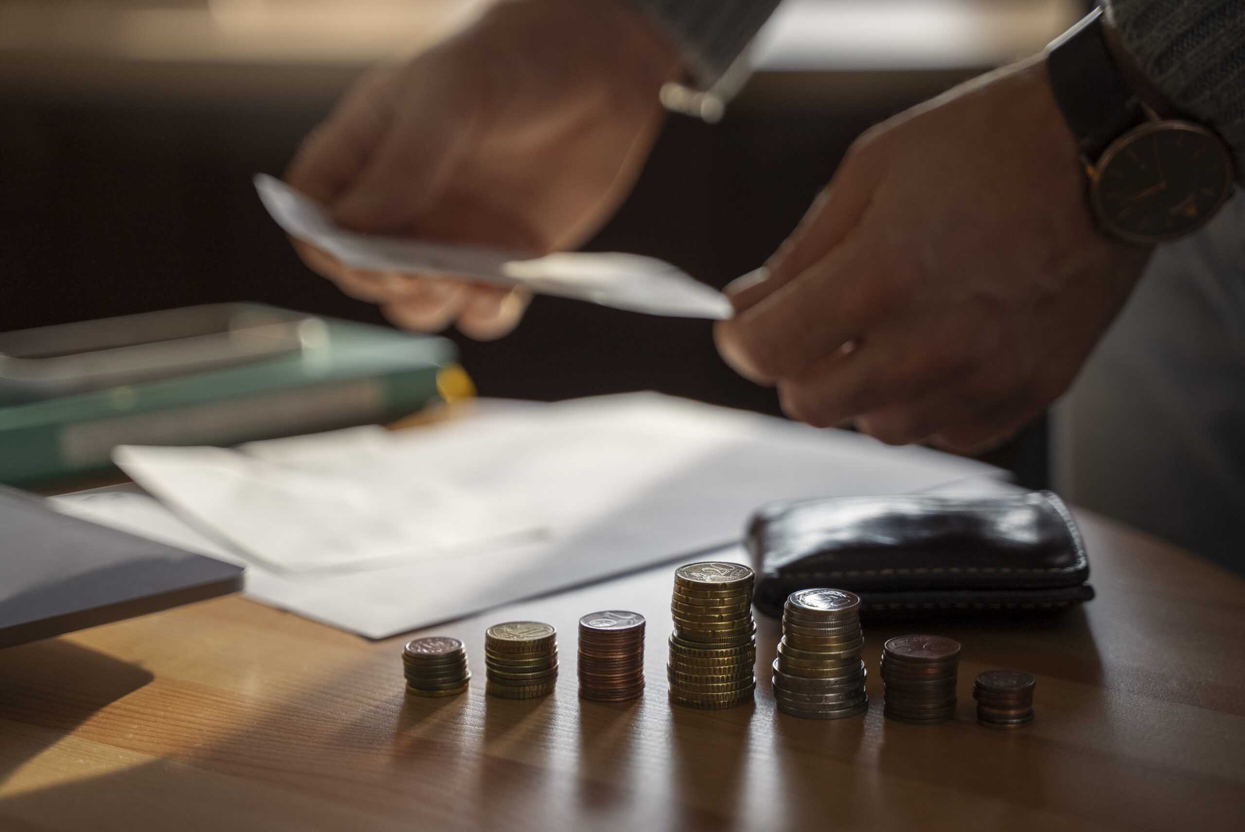 close-up-coins-saved-energy-crisis-expenses-scaled.jpg
